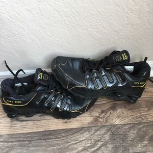 Black with yellow trim Nike shox