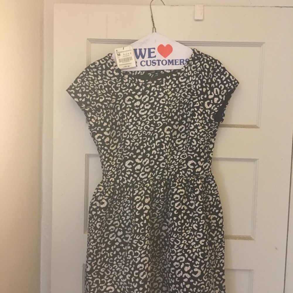 Zara dress still has tags attached. Never worn.