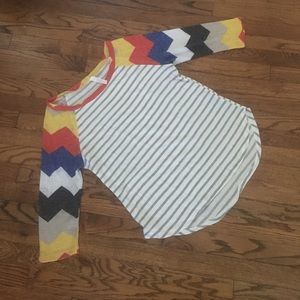 Super cute striped shirt with chevron sleeves!