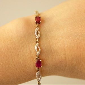Ruby and diamond gold tennis bracelet