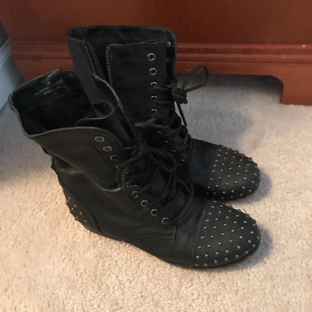 Stylish black studded combat boots