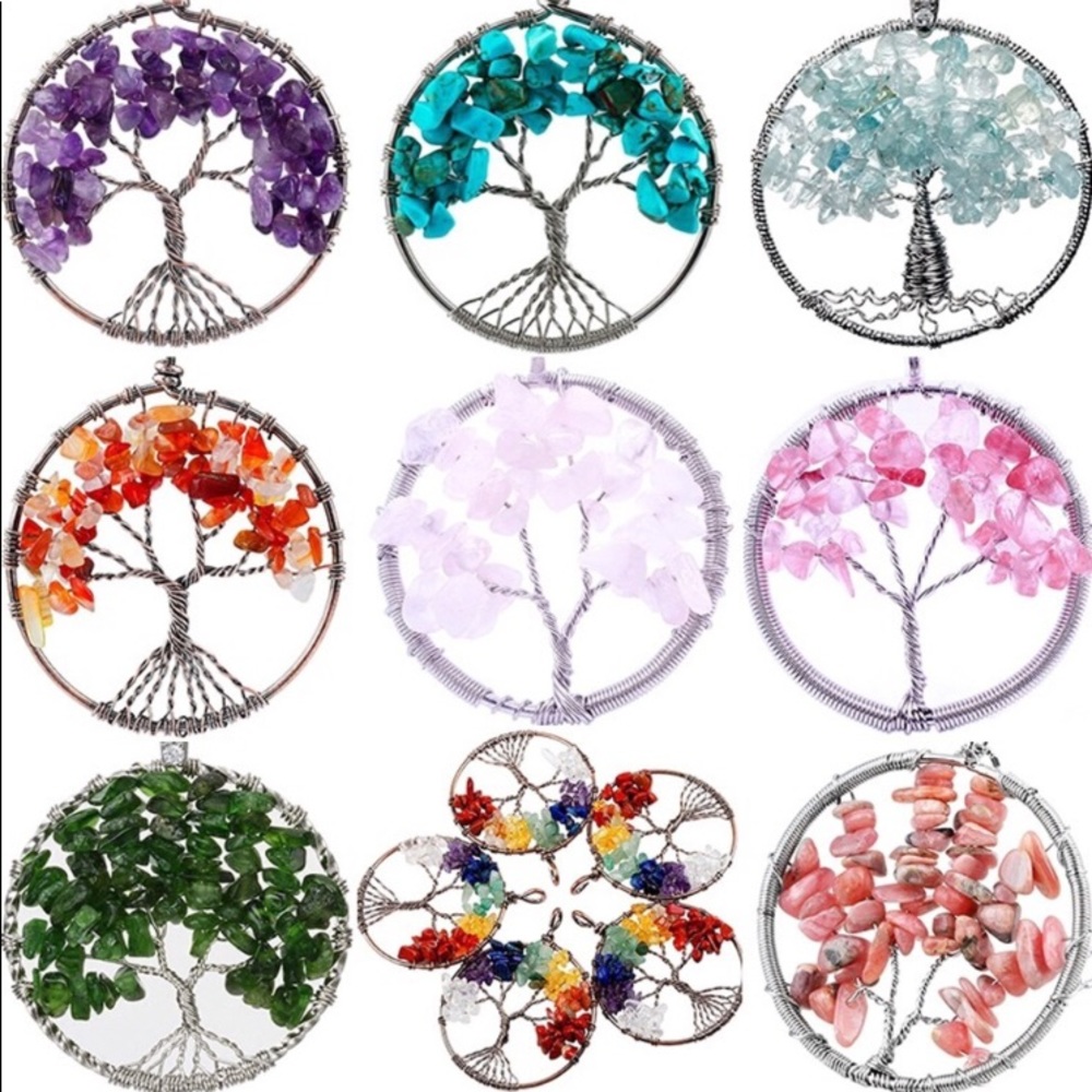 Three handmade tree of life necklaces.