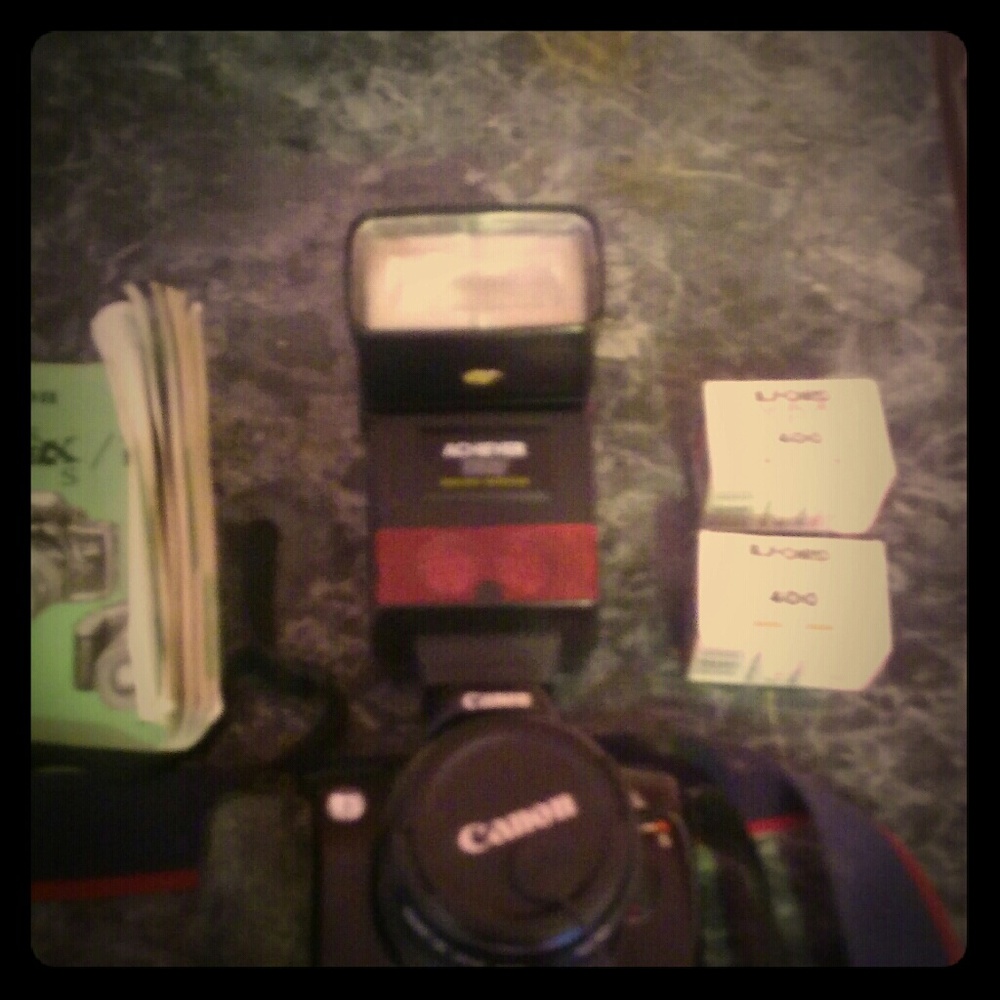 Camara with films and bag and flash