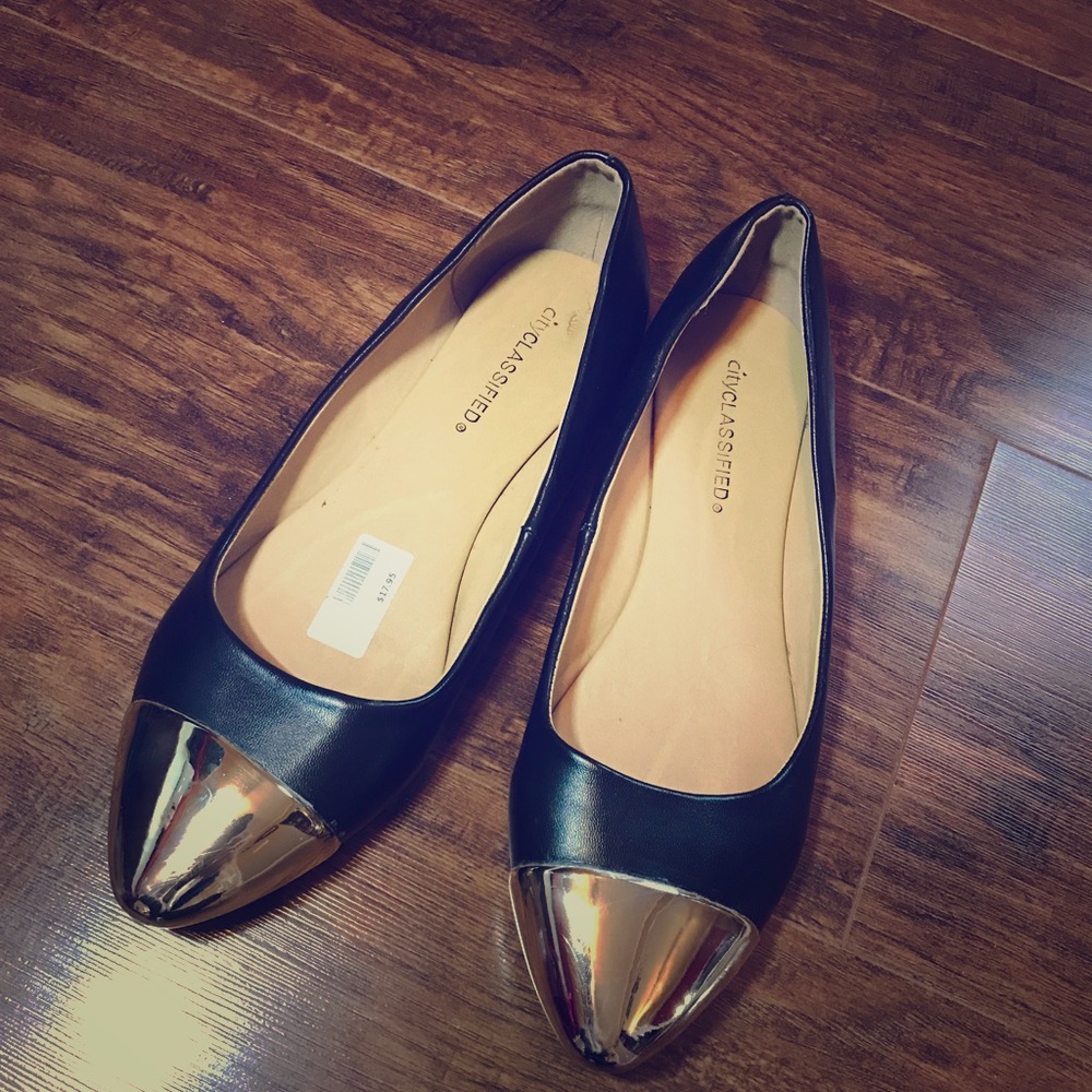 Woman black and gold flats size 9