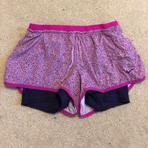 NIKE DRI-FIT shorts w/ spanks underneath. Size med