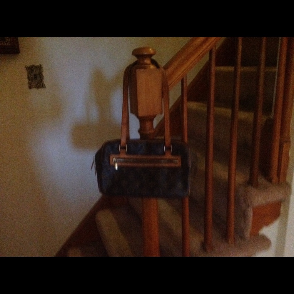 Louis Vuitton Cite MM handbag on hold