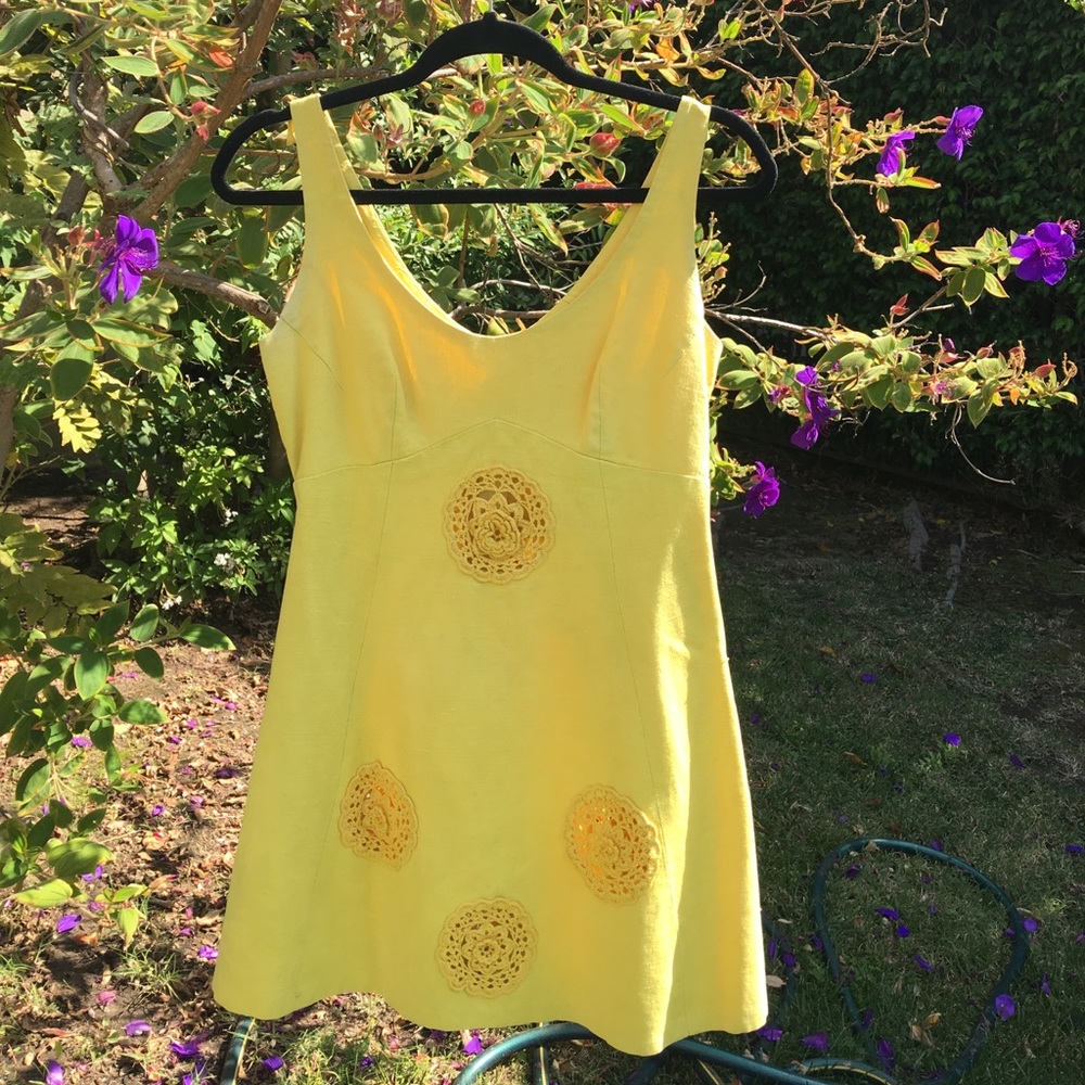 1960’s linen dress with crochet flower pendants.