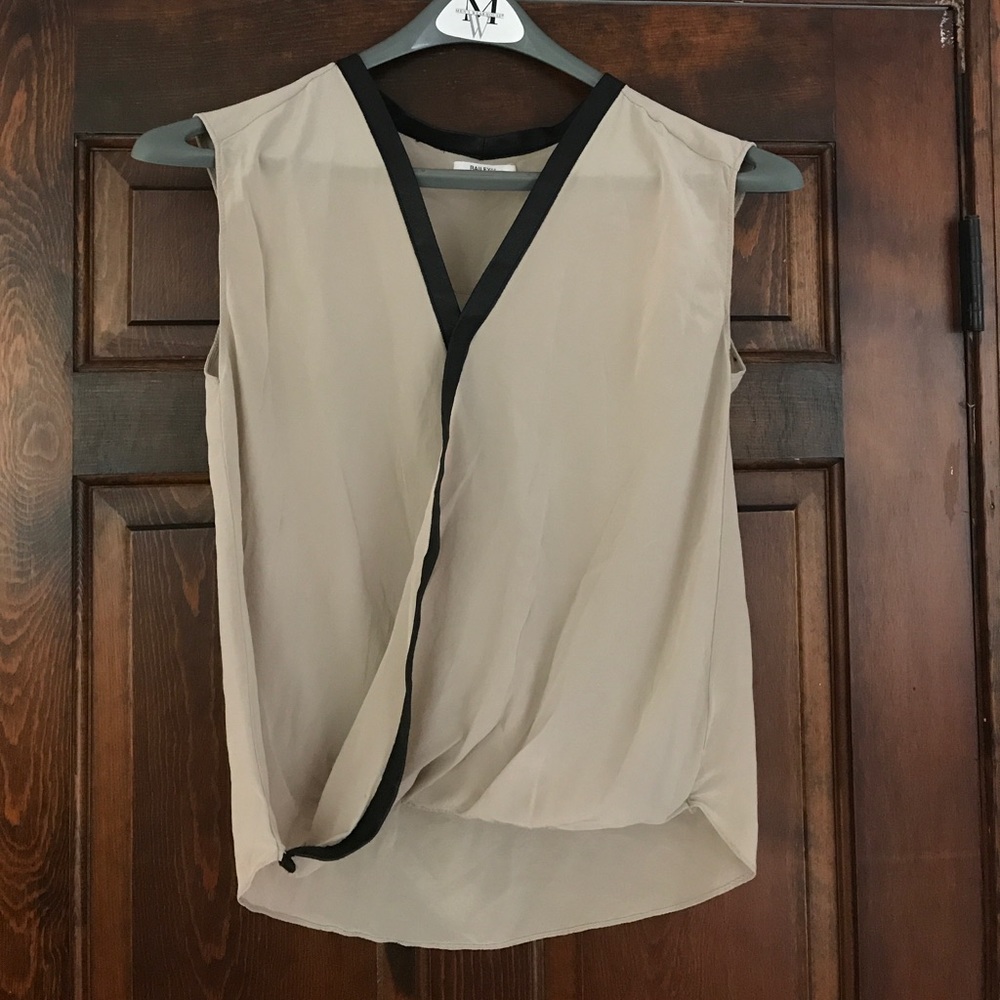 Tan blouse with exclusive leather trim