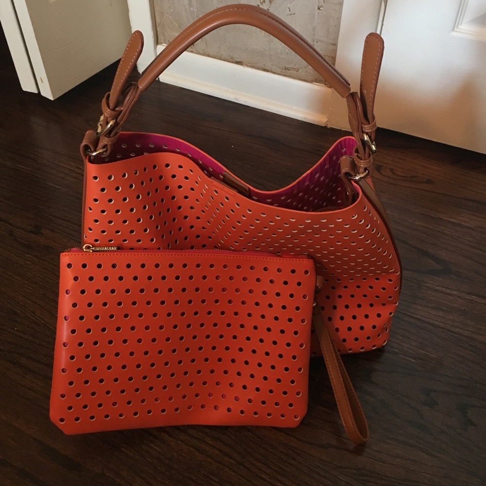Orange handbag and clutch