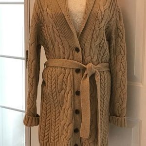 Cable knit Mid length sweater with belt.