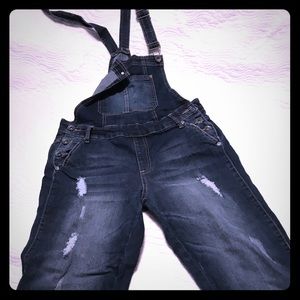 Distressed overall jeans