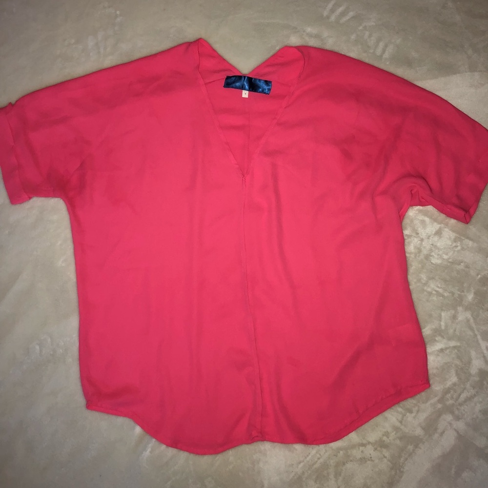 Oversized bright pink top