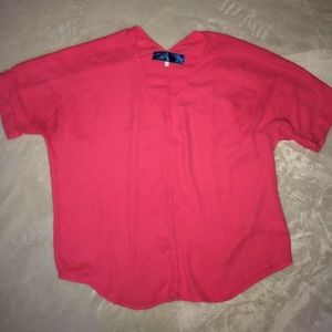 Oversized bright pink top