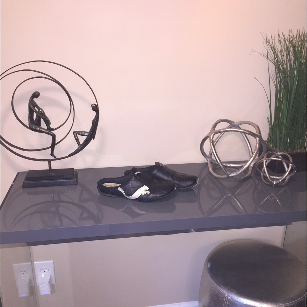 Trendy black Puma slip-on shoes