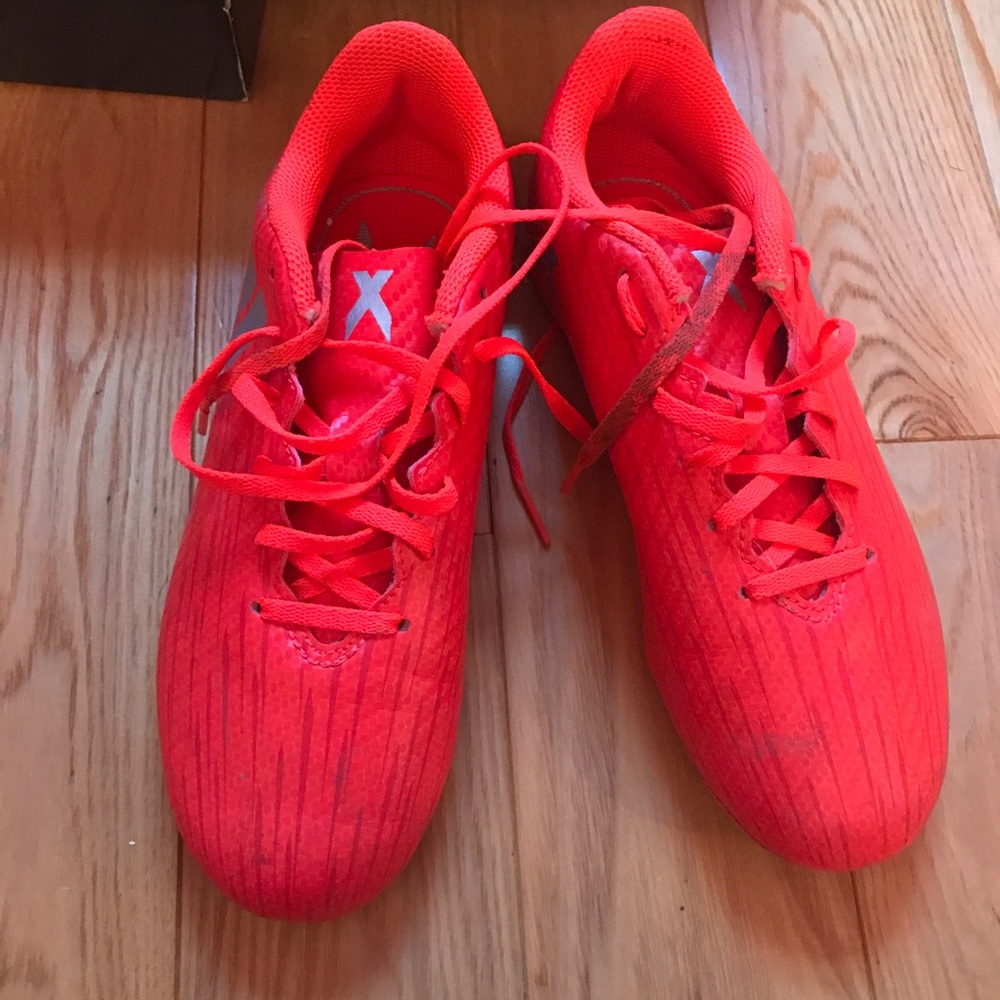 Boys soccer cleats and shin guards