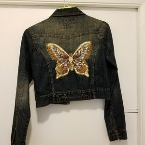Jean jacket with butterfly embellishment