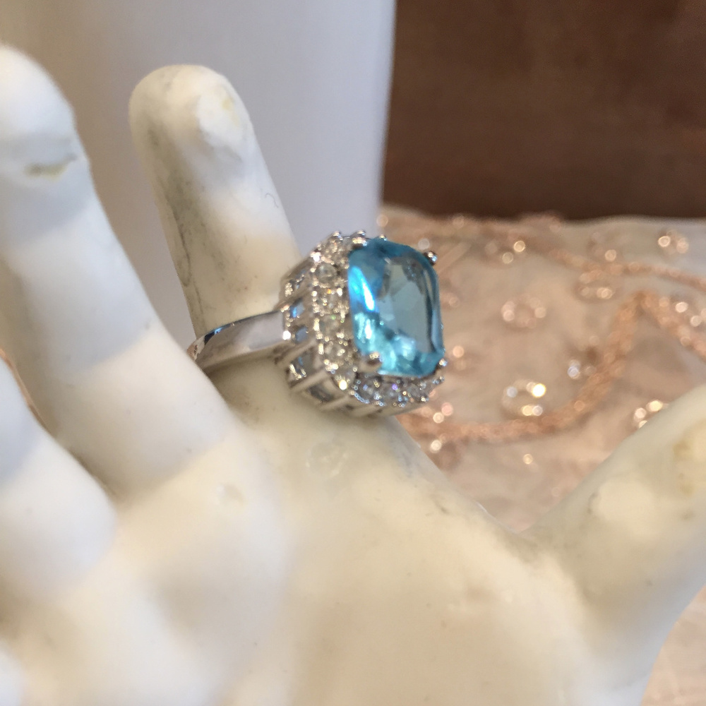 Silver Clad Ring With Blue Topaz Mist