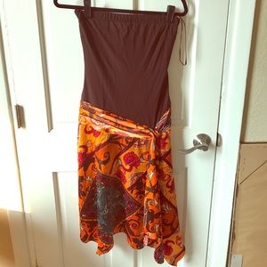 Cache tube top dress