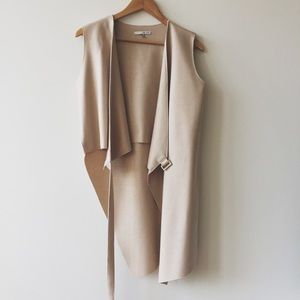 Asymmetrical sleeveless blazer