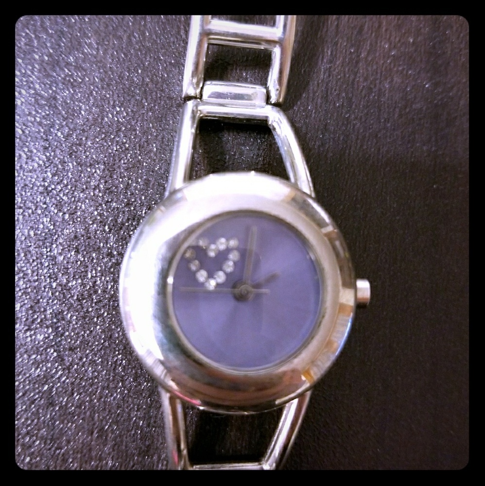 Purple inlay watch with diamonds inside