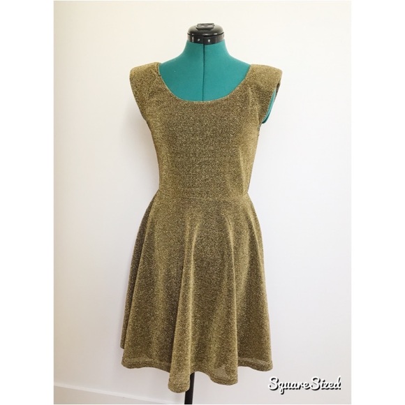 Ya Los Angeles Dresses & Skirts - Gold sparkle Fit & Flair Dress with shoulder pad