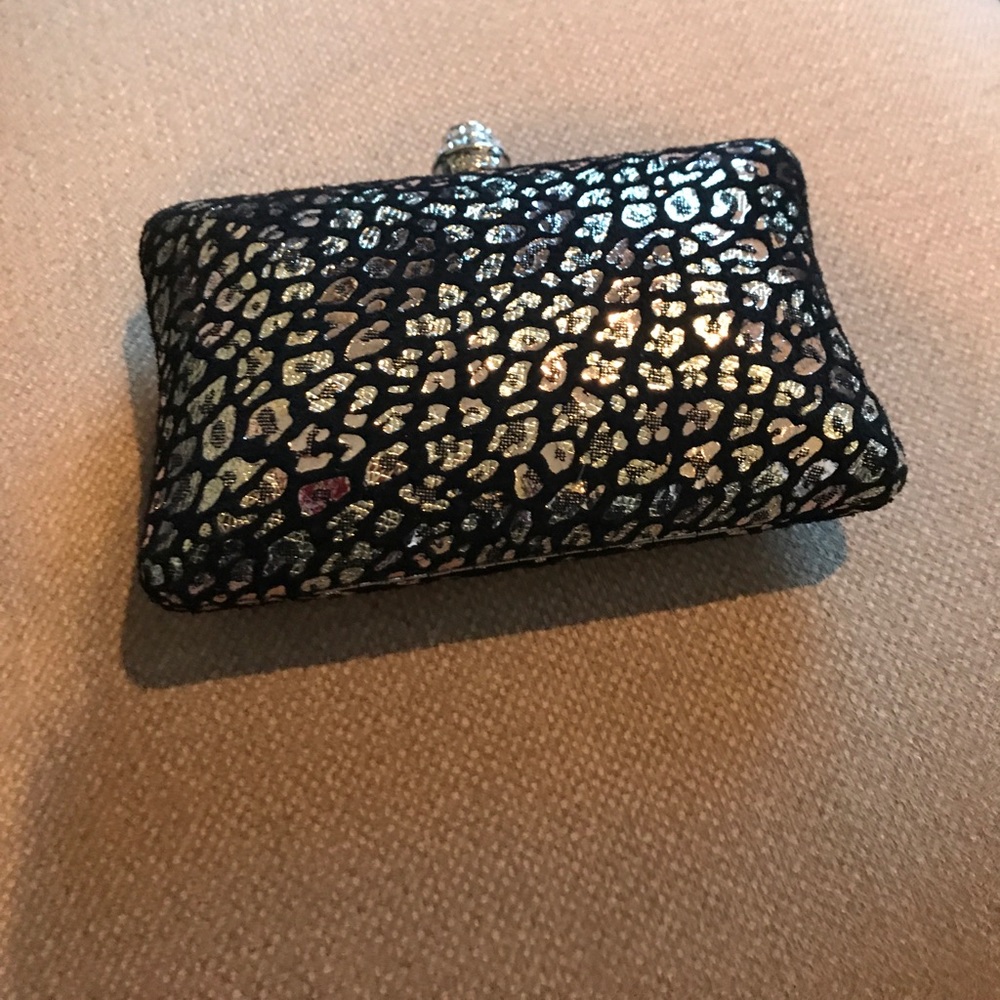 Black and silver leopard clutch with silver chain