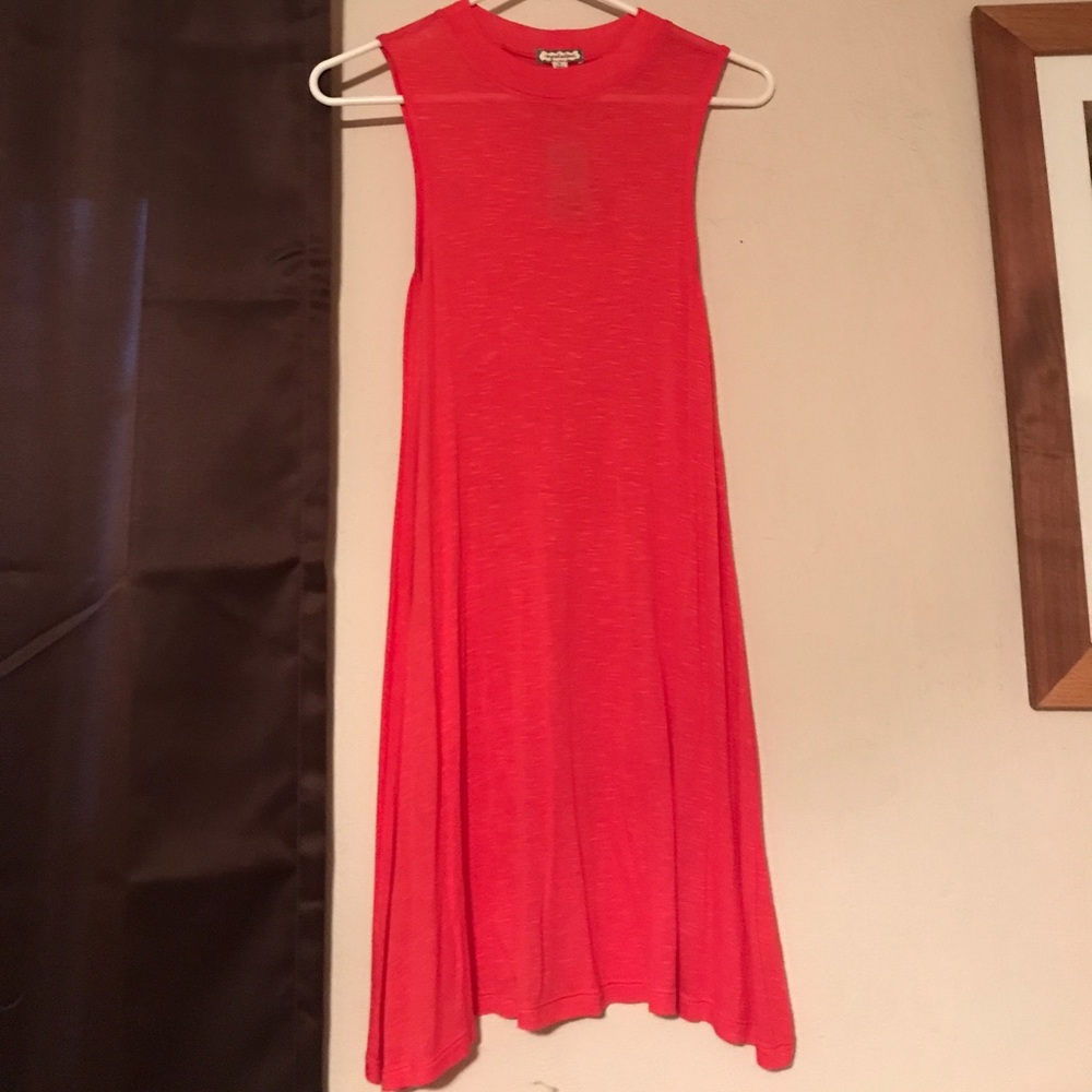 Buckle tank top. Very light. Never worn.