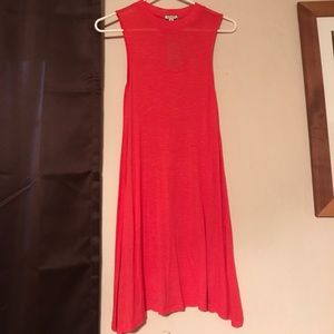 Buckle tank top. Very light. Never worn.