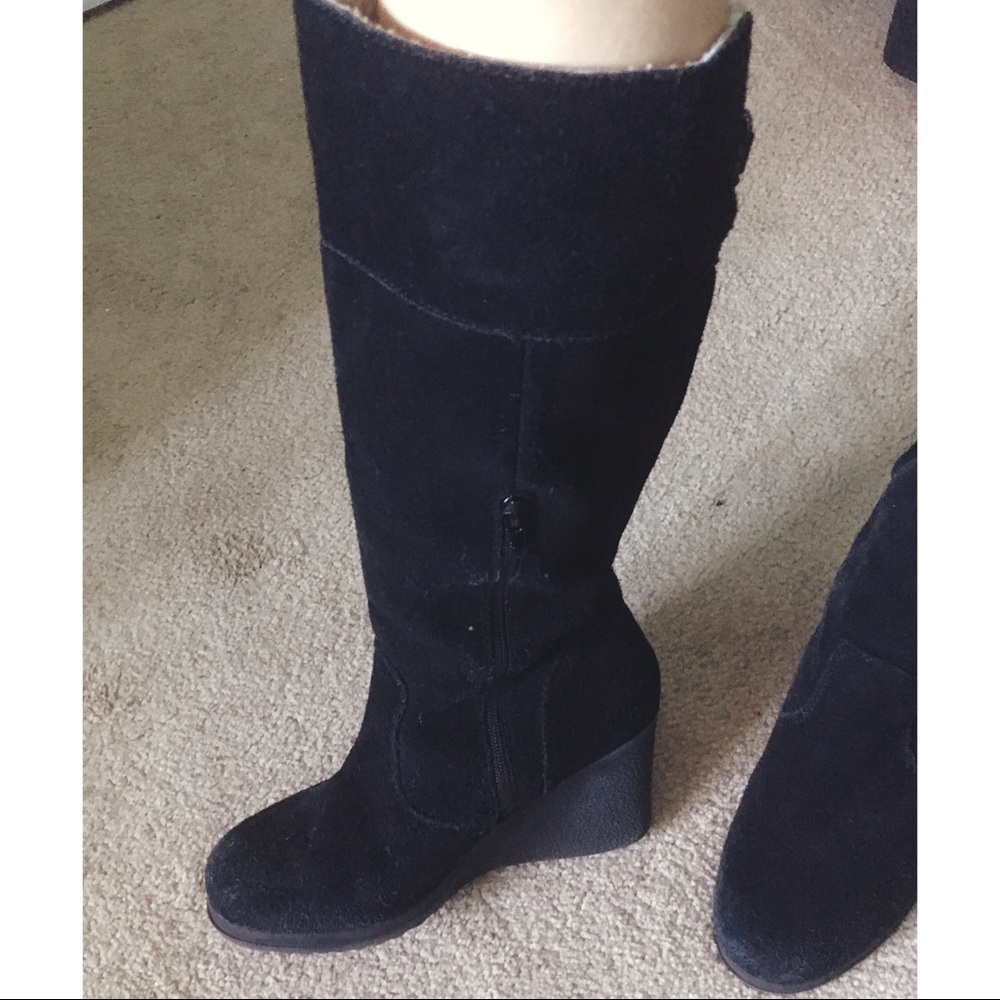 Bjorndal black suede heel boots.