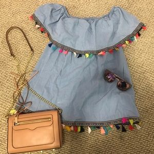 Off shoulder chambray top with tassel detailing