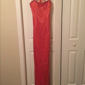 Coral, pink beaded long gown, triangle tie back