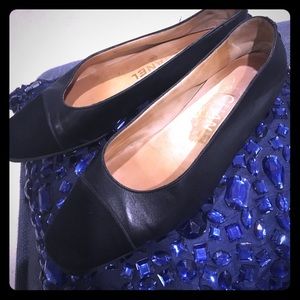Classic CHANEL black leather/satin cap toe flats!