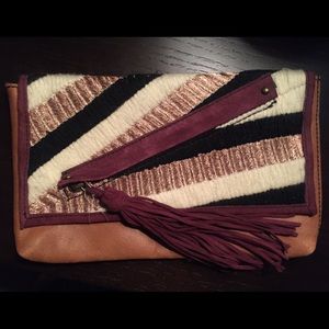 Anthropology fringe clutch! BRAND NEW Anthropology fringe clutch! BRAND NEW