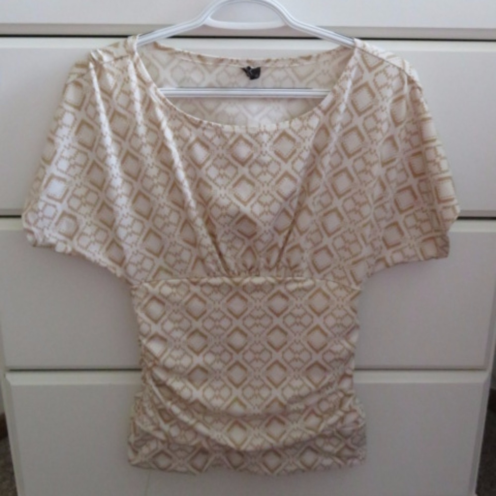 White and gold blouse