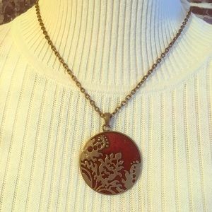 Amber necklace with bronze overlay