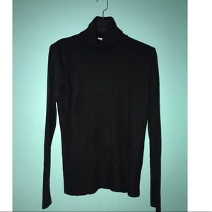 Two Turtleneck Sweaters