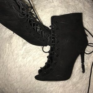 Black strap up heels