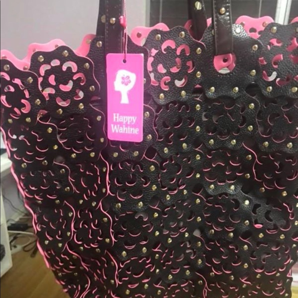 Brand new flower cut out handbag