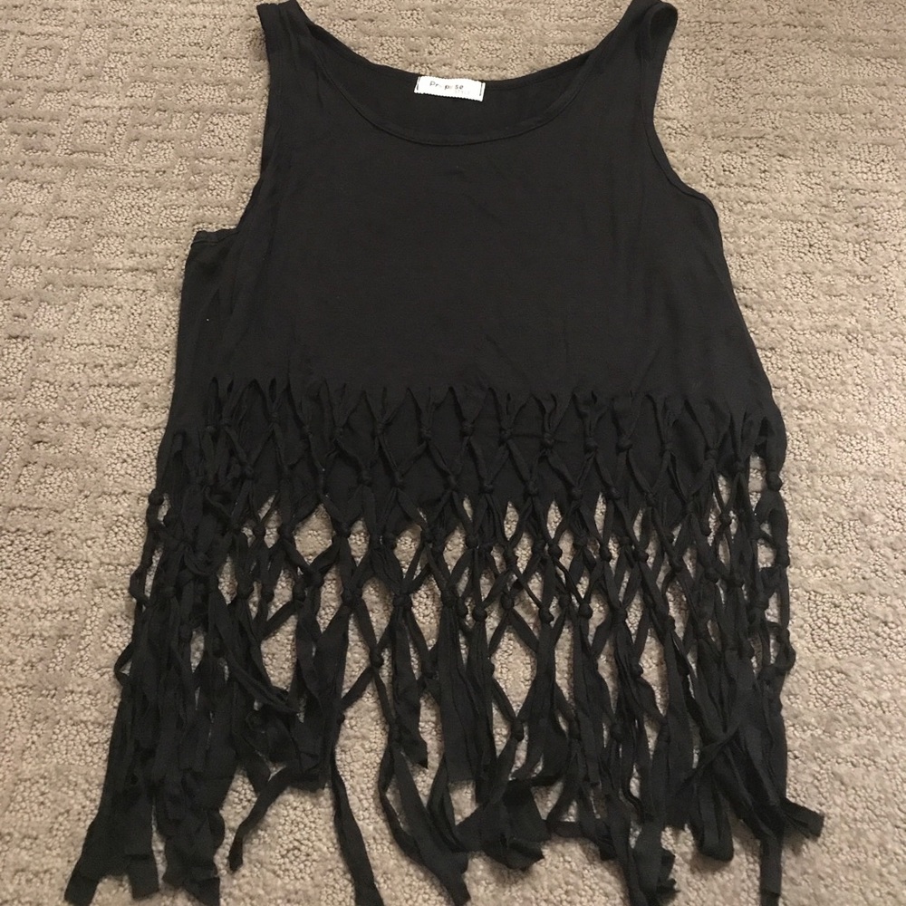 Lose tank top with fringe bottom