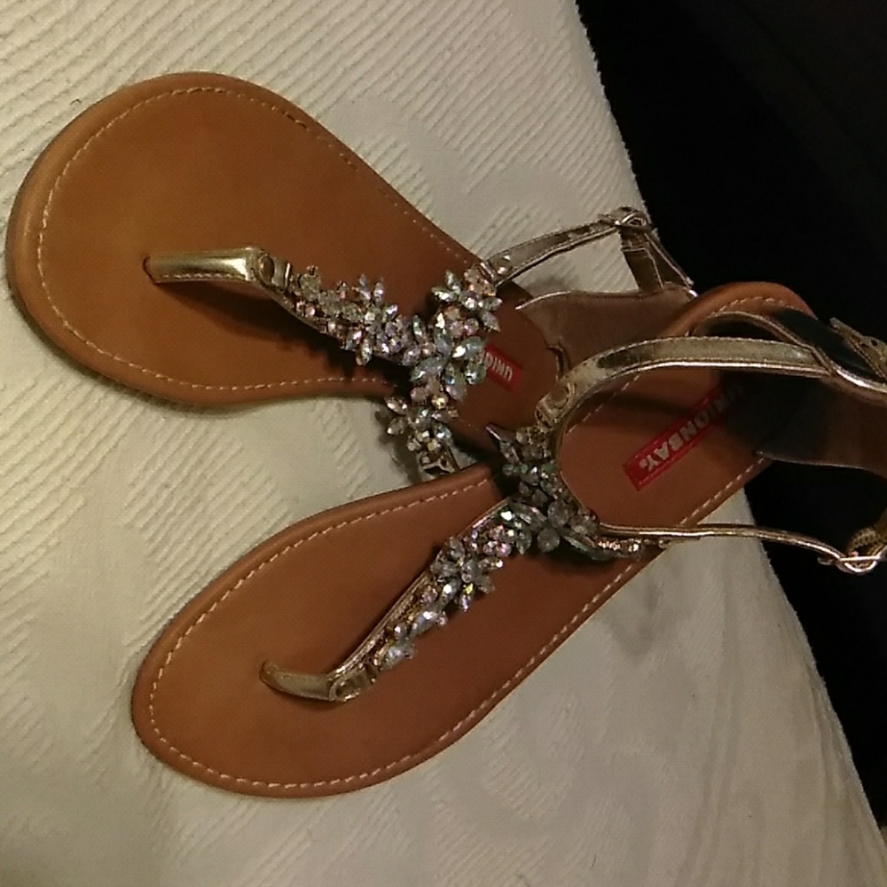 Bling sandals zip in the back.