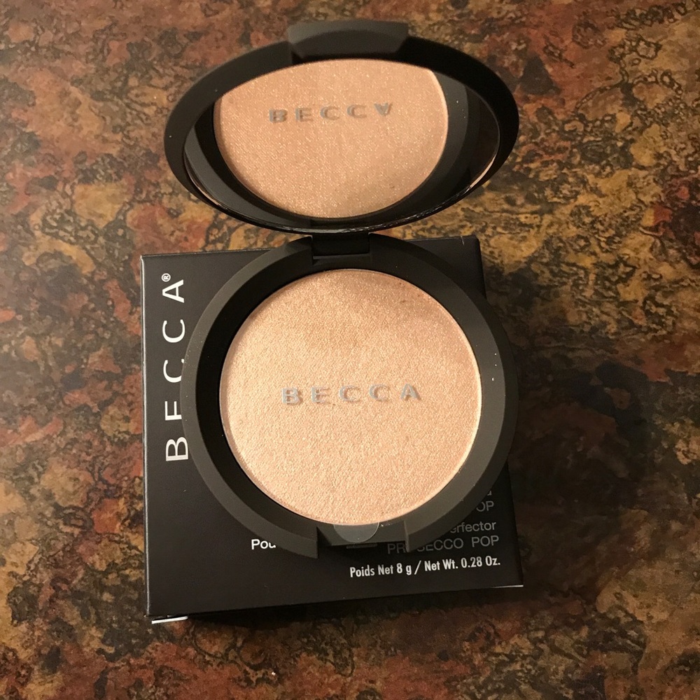 BECCA Shimmering Skin Protector Pressed Powder