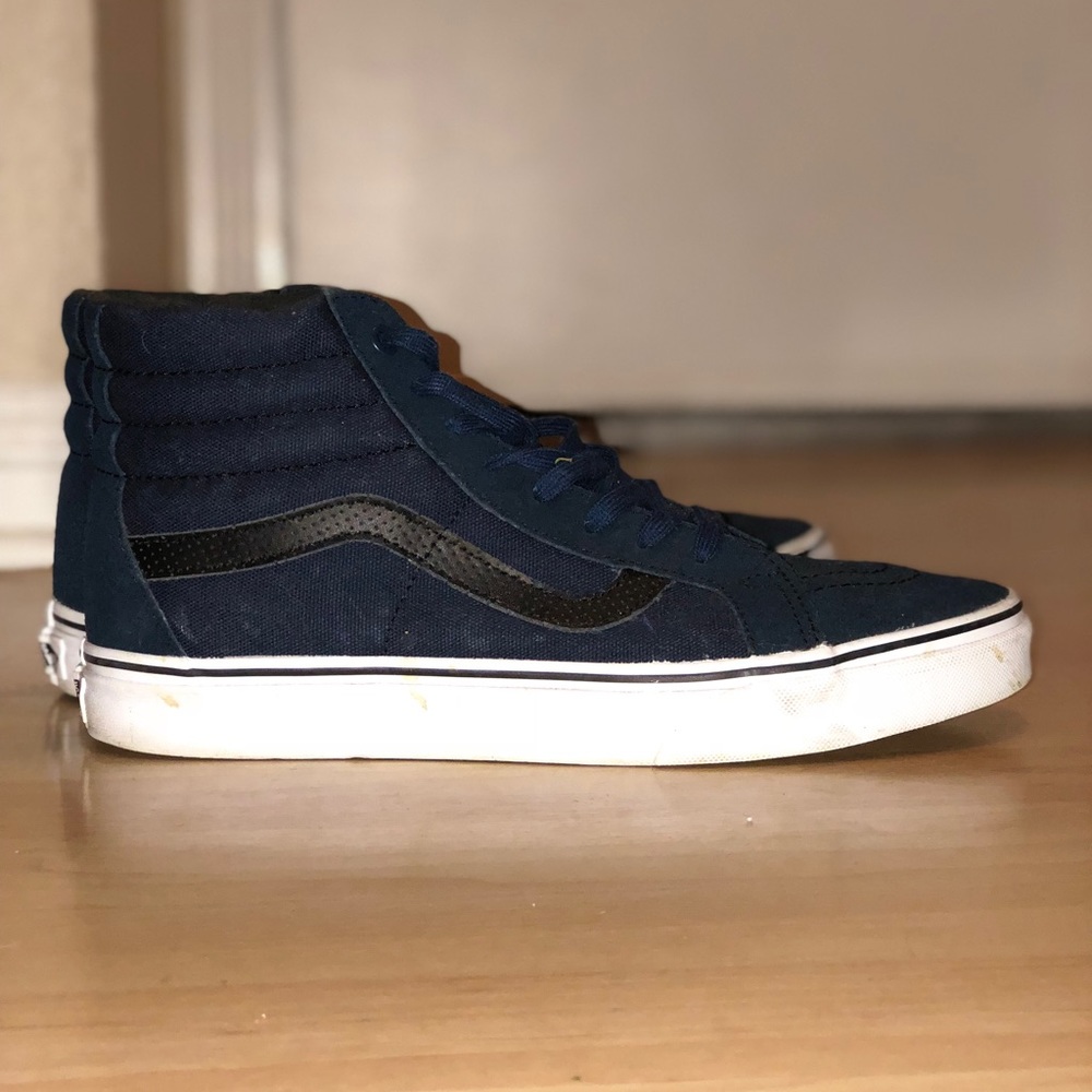 Navy blue and black vans sk8 his