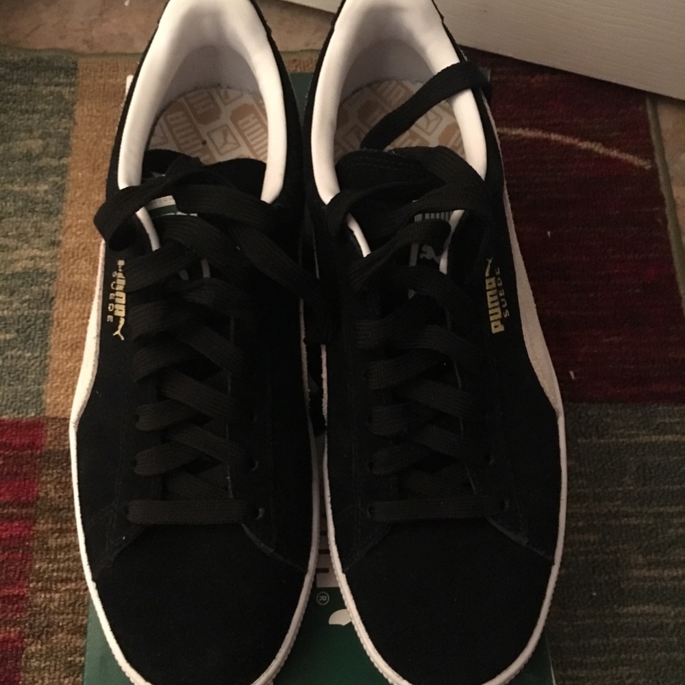 Black Puma Suedes