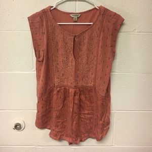 Burnt orange with black design