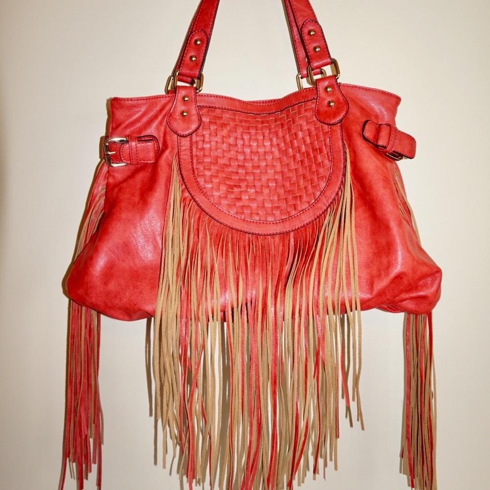 Pink woven bag with fringe