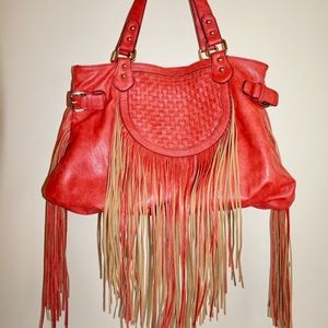 Pink woven bag with fringe