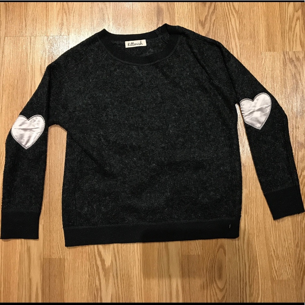 Kittenish heart sleeve sweater