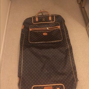 Louis Vuitton garment bag. Comment for offers.