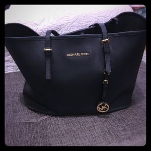 Leather bag by Michael Kors