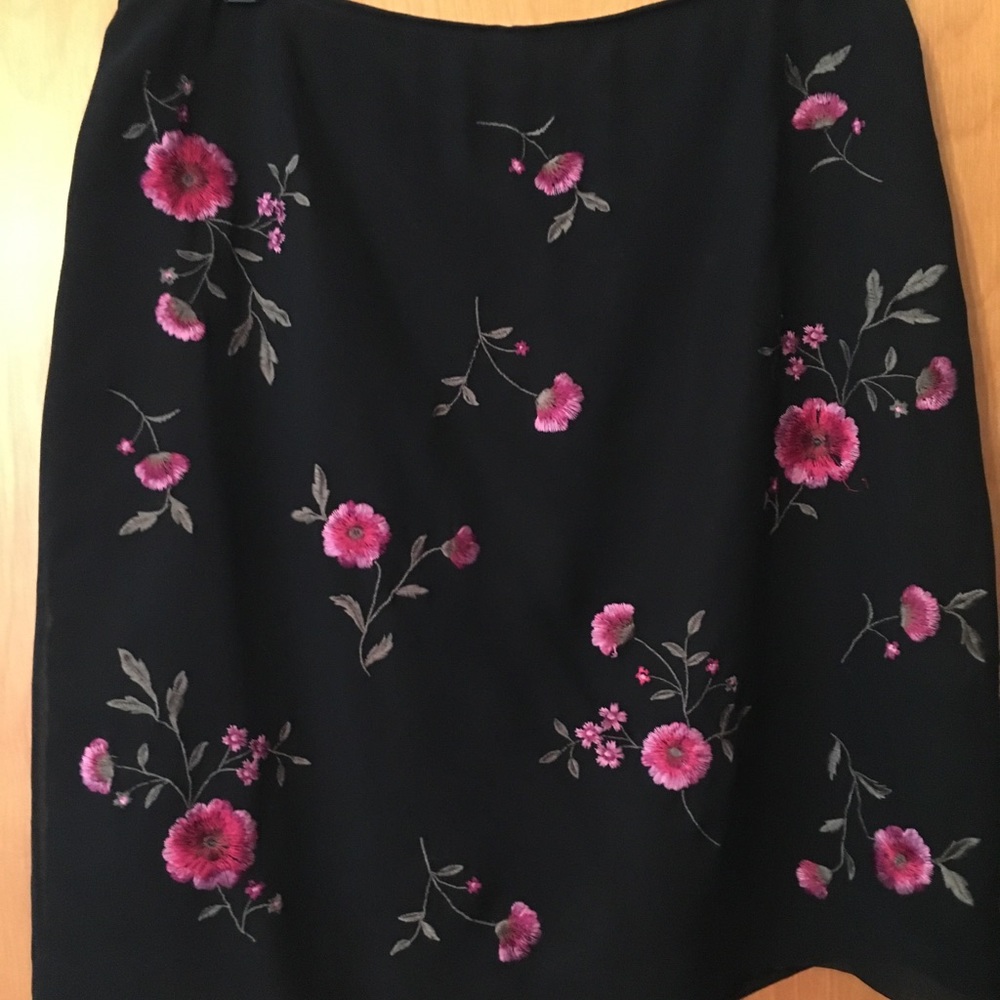Black Silk lined floral embroidered skirt.
